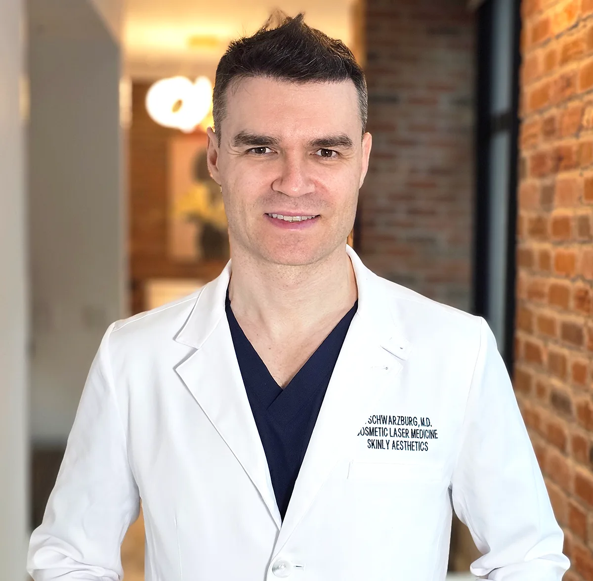 Dr. Schwarzburg, founding physician of Skinly Aesthetics in New York City